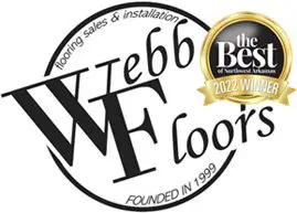 A logo for webb floors, with the company 's name and seal.